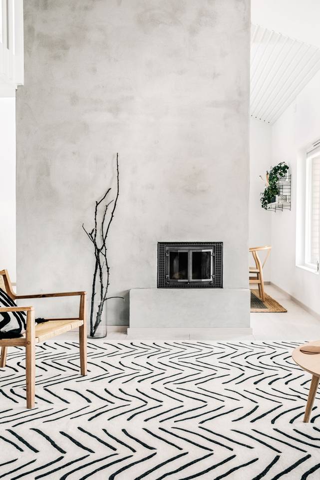 Brown / yellow  handtufted -  Carpet in a living room.