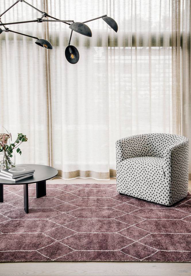 Pink  bamboo silk handloom -  Carpet in a living room.