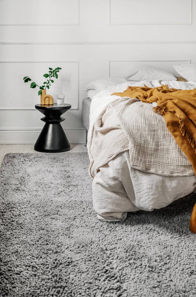 Black / grey  berber stick shaggy -  Carpet in a bedroom.