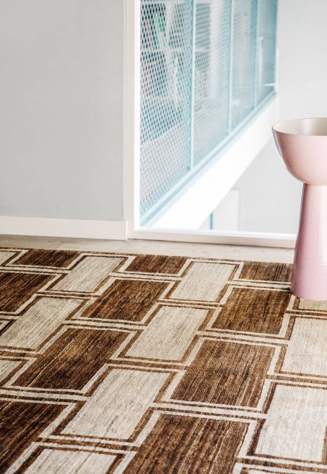 Brown / yellow  ziegler modern -  Carpet in a dining area.