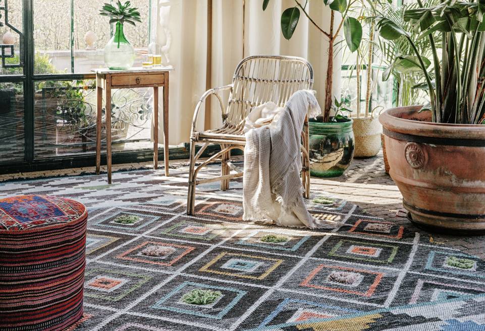 Black / grey  kilim berber -  Carpet in a living room.