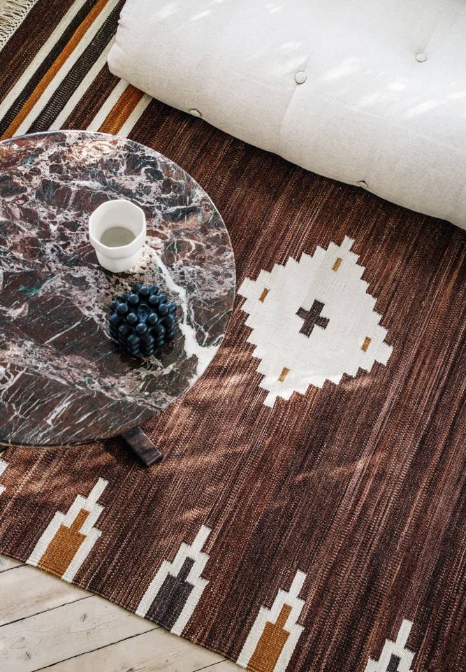 Brown / yellow  kilim modern -  Carpet in a living room.