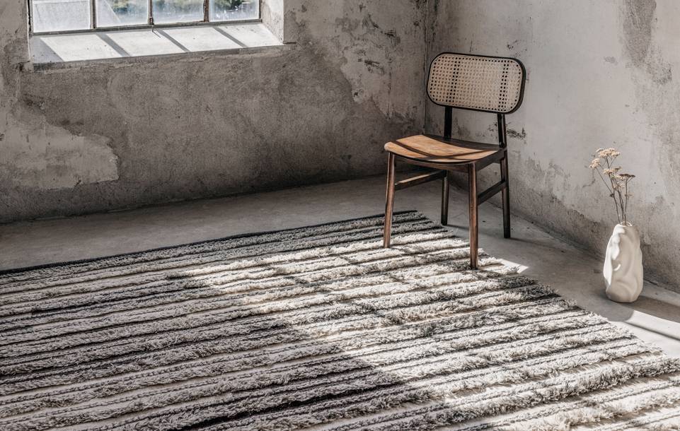 Black / grey  kilim berber -  Carpet in a living room.