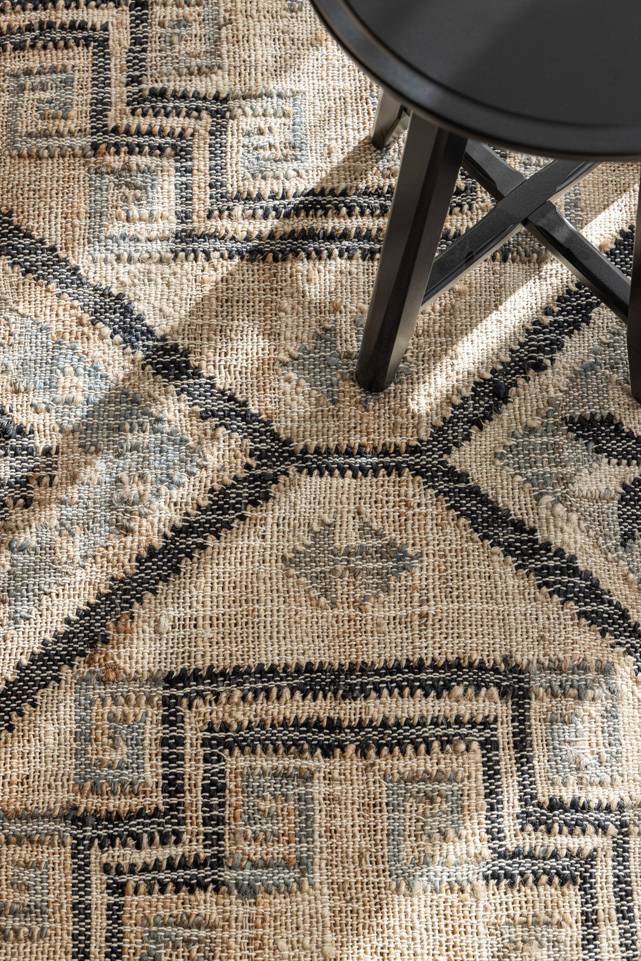 Black / grey  jute cotton -  Carpet in a living room.