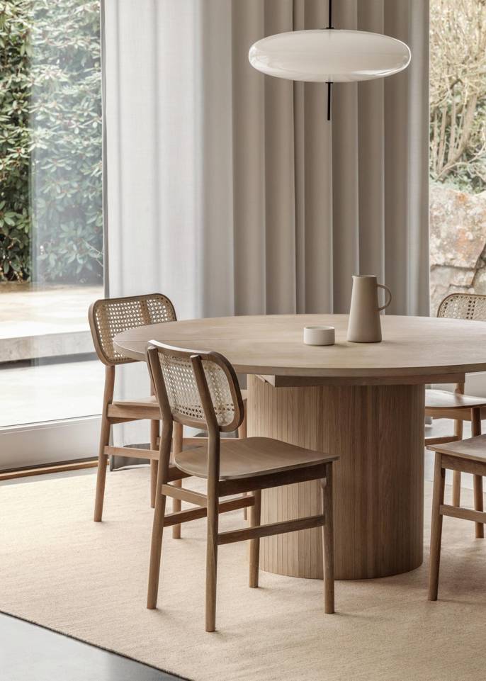 Brown / yellow  kilim modern -  Carpet in a dining area.
