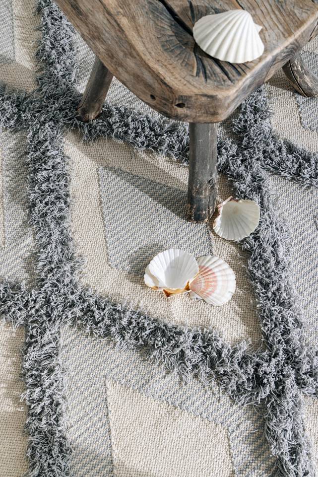 Black / grey  high low cotton pile -  Carpet in a living room.