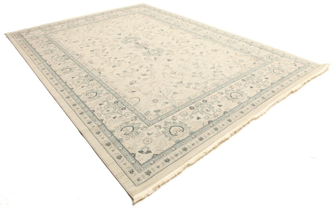 beige og grønt tæppe med franser