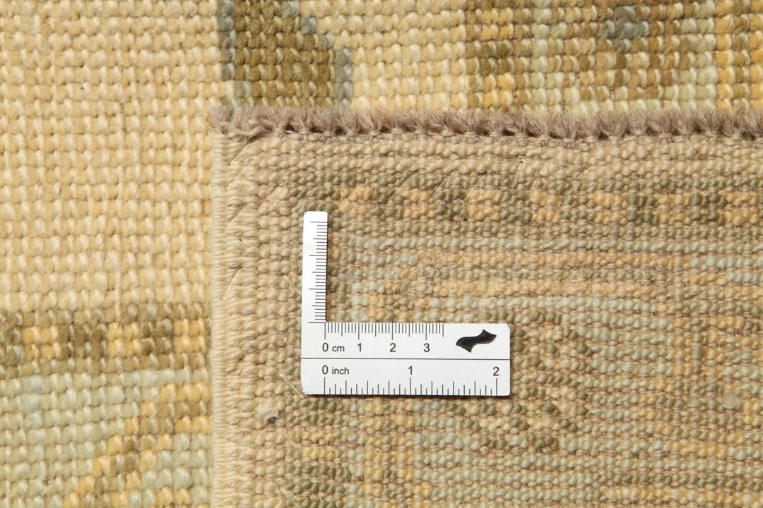 Handgemaakt Turks Usak tapijt in beige en groene tinten