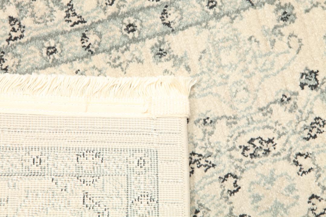 Beige en groene loper met gedetailleerd patroon