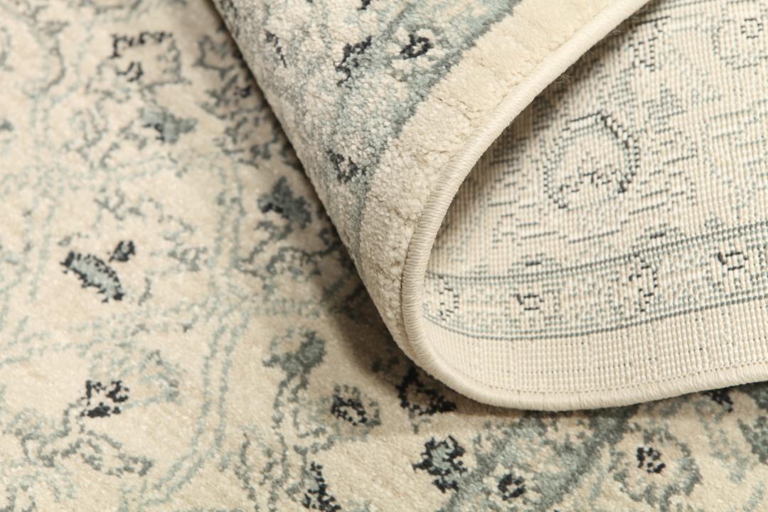 Beige en groene loper met gedetailleerd patroon