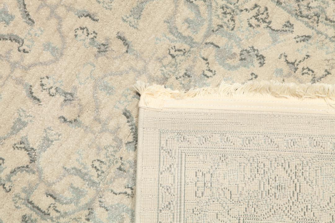 Beige en lichtblauwe loper met franjes