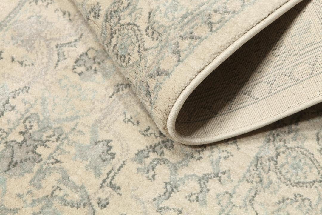Beige en lichtblauwe loper met franjes