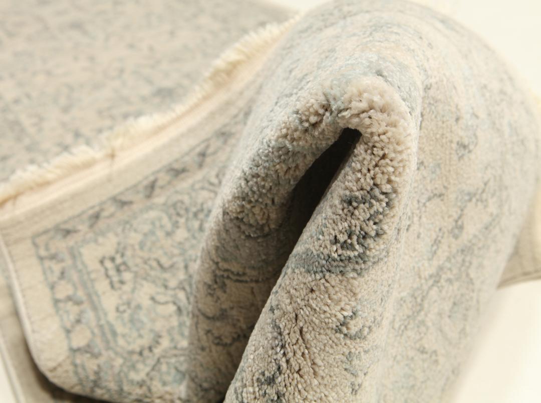 Beige en lichtblauwe loper met franjes