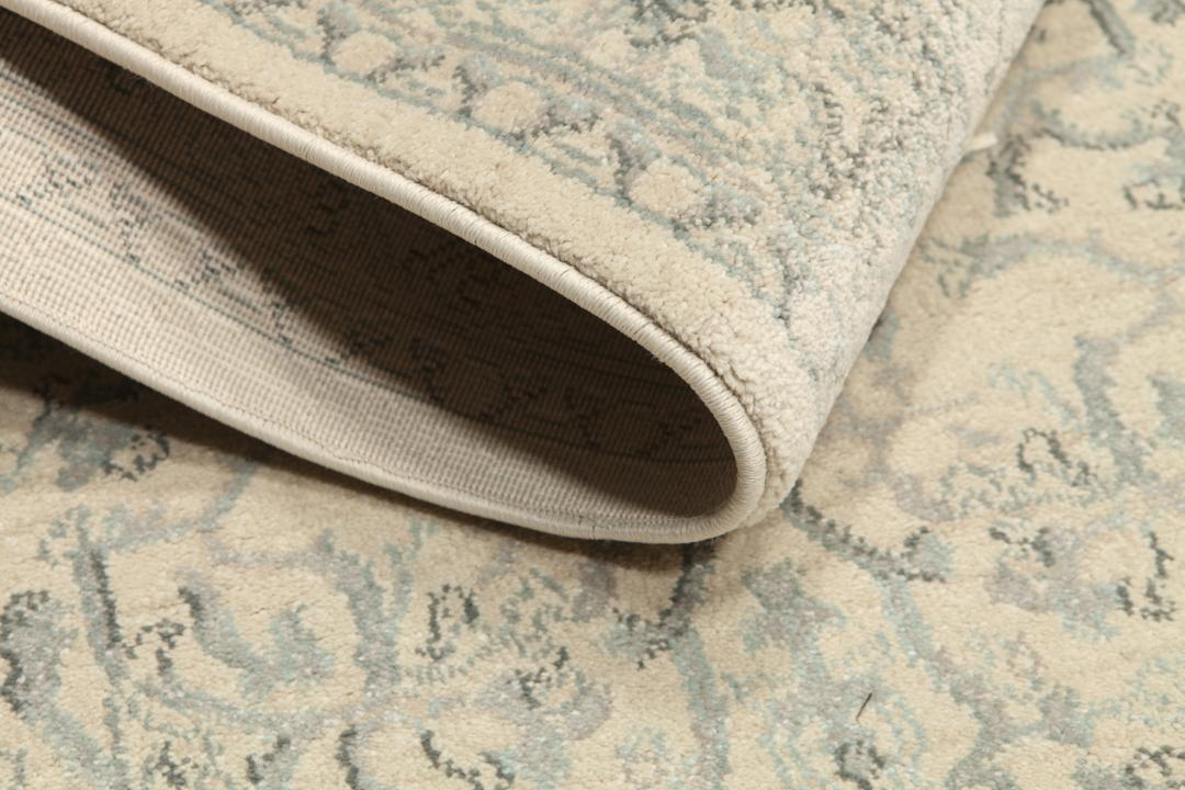 Beige en lichtblauwe loper met franjes