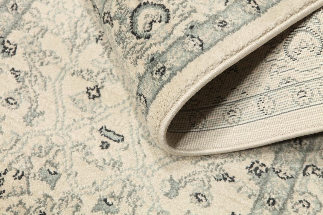 Beige en groene loper met gedetailleerd patroon