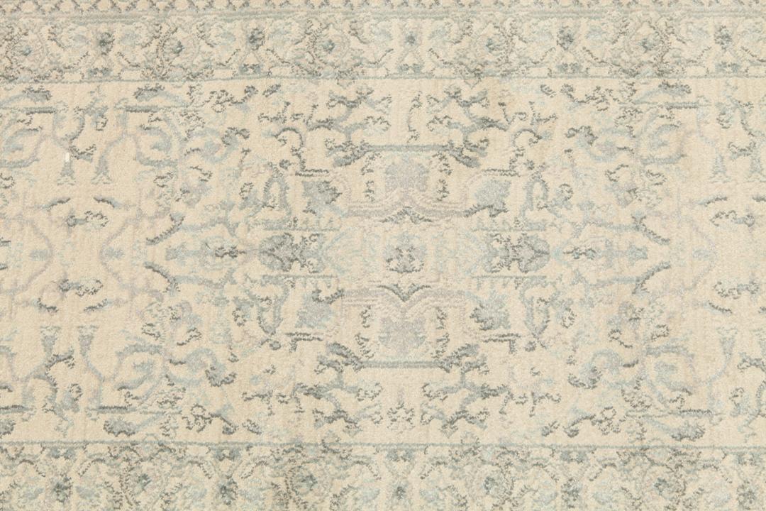Beige og lyseblå løbertæppe med fringe
