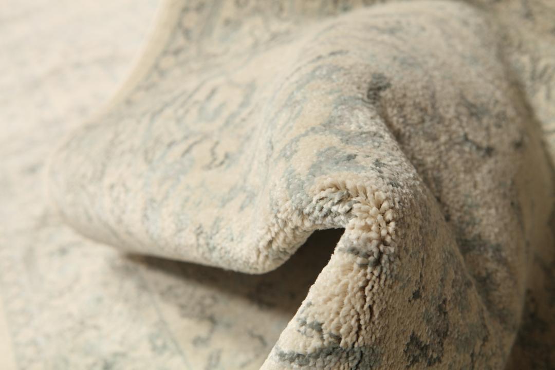 Beige og lyseblå løbertæppe med fringe
