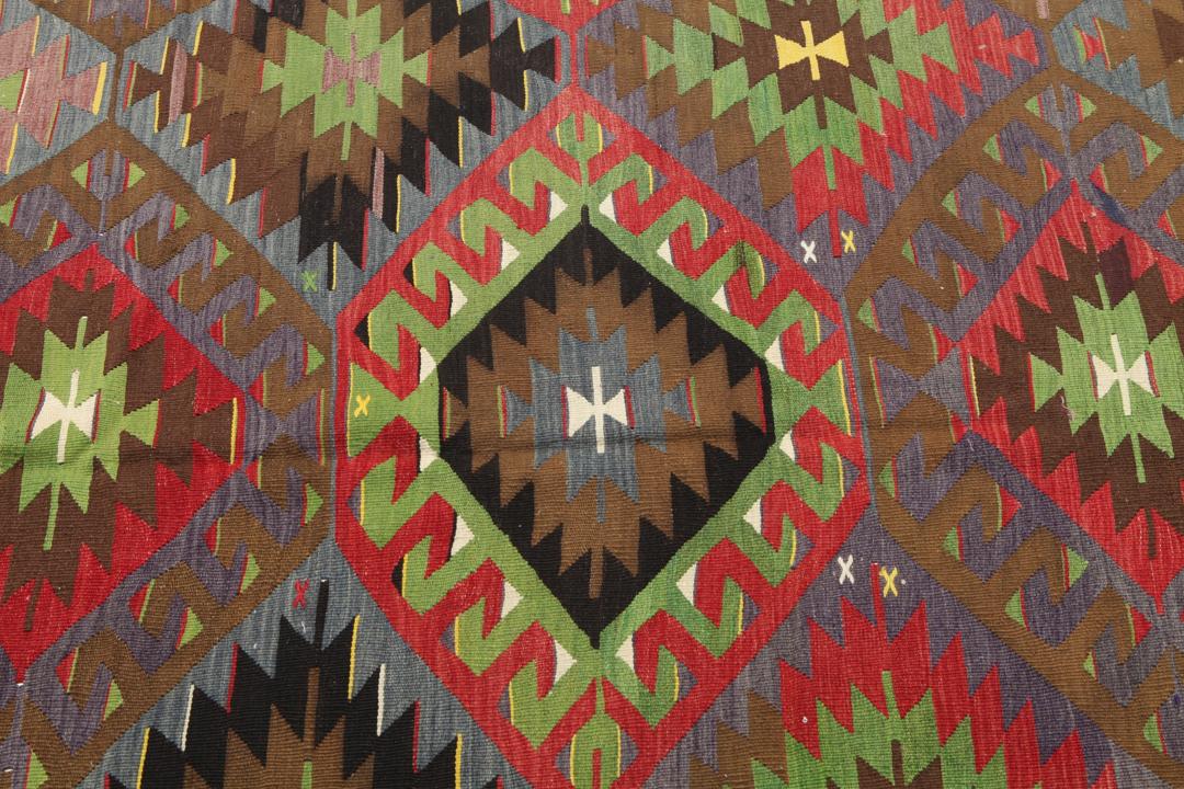 Vintage handgeweven Turks kelimkleed met een geometrisch patroon in multicolor tinten.