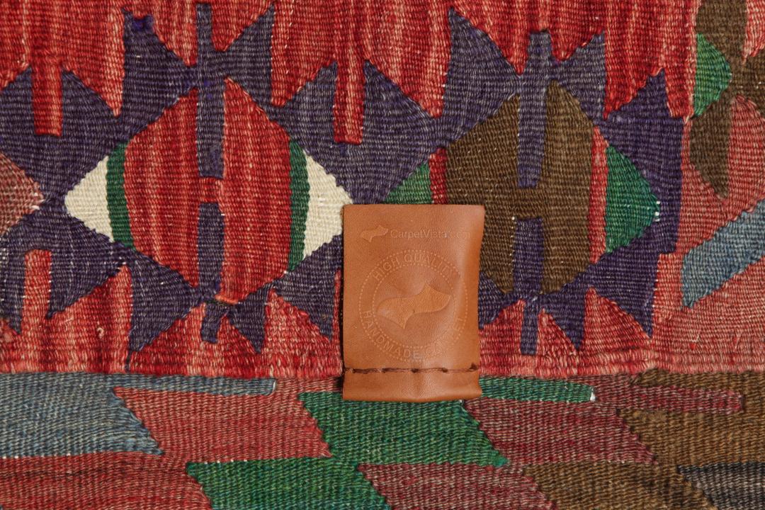 Tapis Kilim turc vintage tissé à la main avec des motifs géométriques multicolores