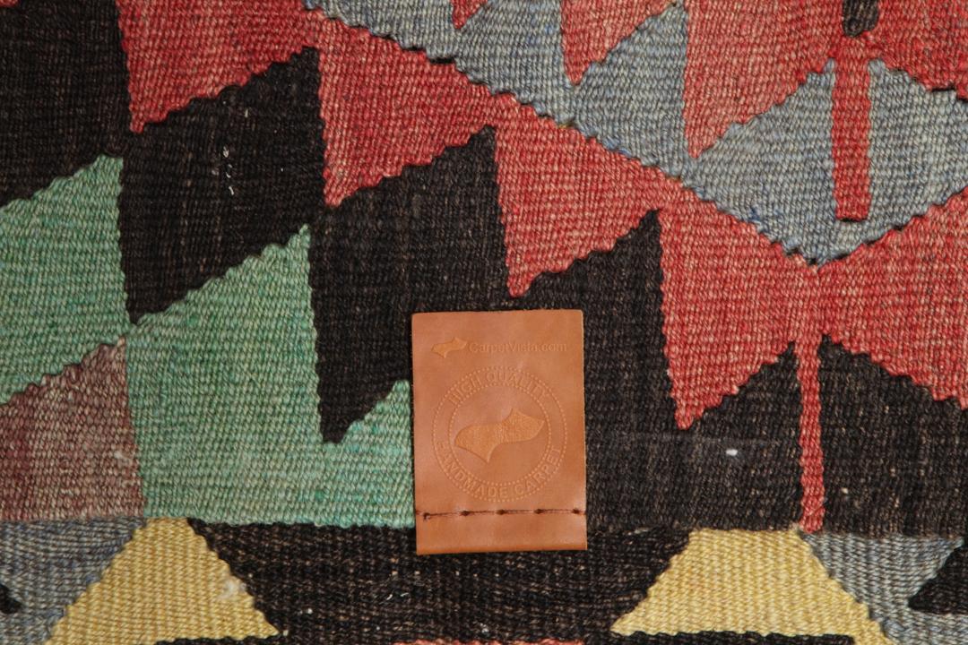 Met de hand geweven Turks Kelim-kleed met levendige geometrische diamantpatronen in multicolor wol
