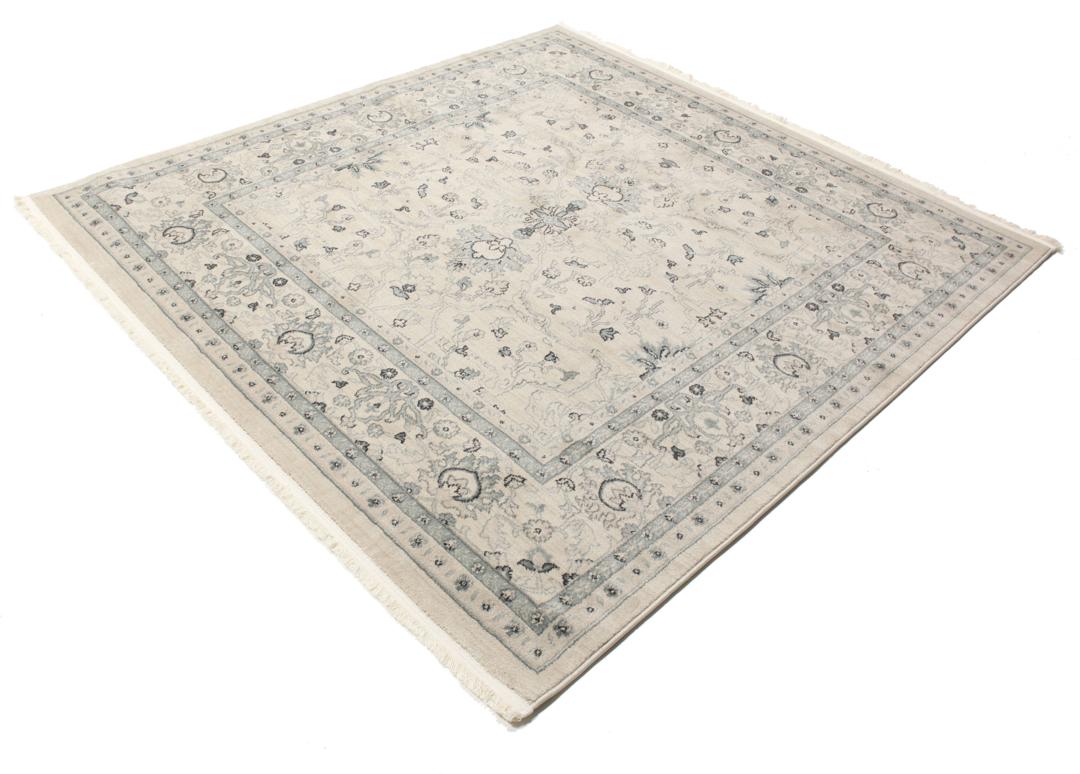 Vierkant beige tapijt met groene florale patronen en franjedetails