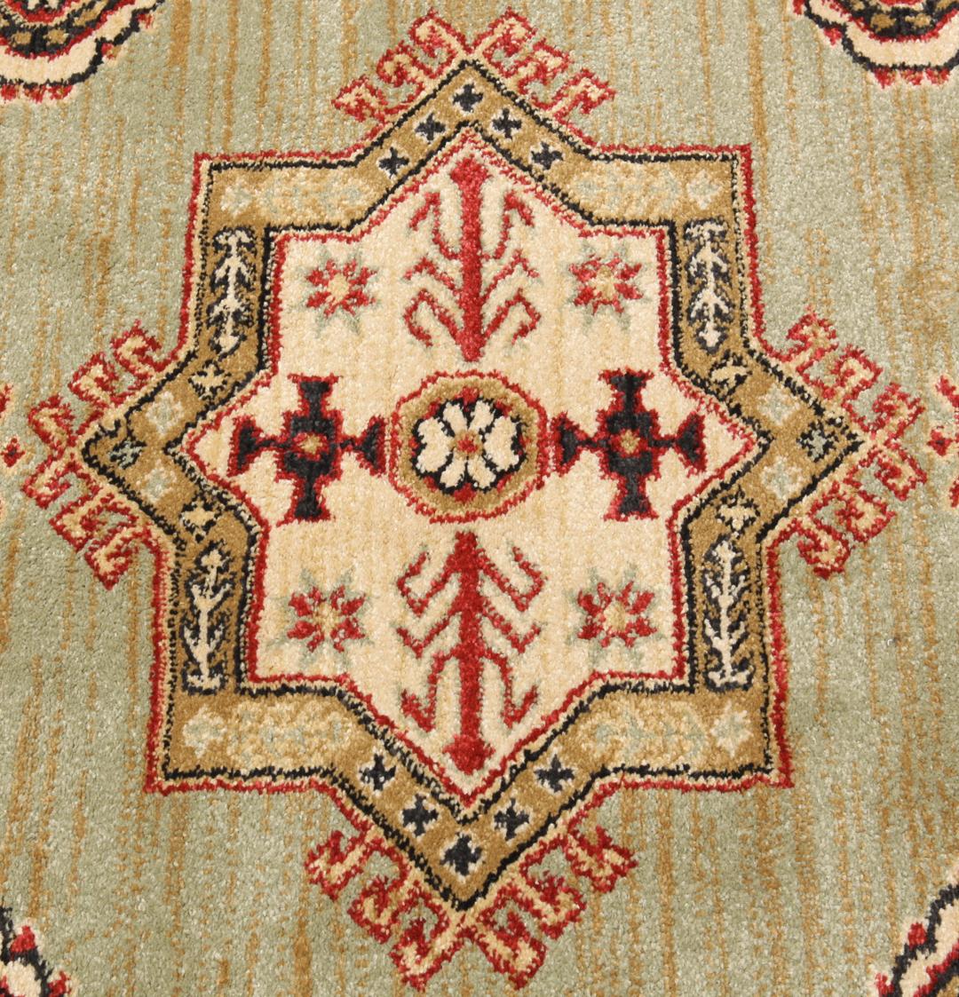 Lichtgroen en crèmekleurig beige vloerkleed met geometrisch patroon
