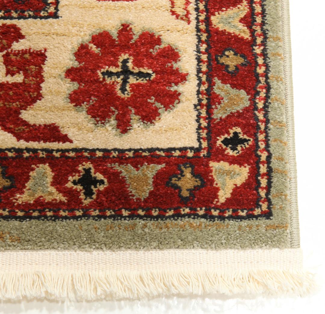 Lichtgroen en crèmekleurig beige vloerkleed met geometrisch patroon