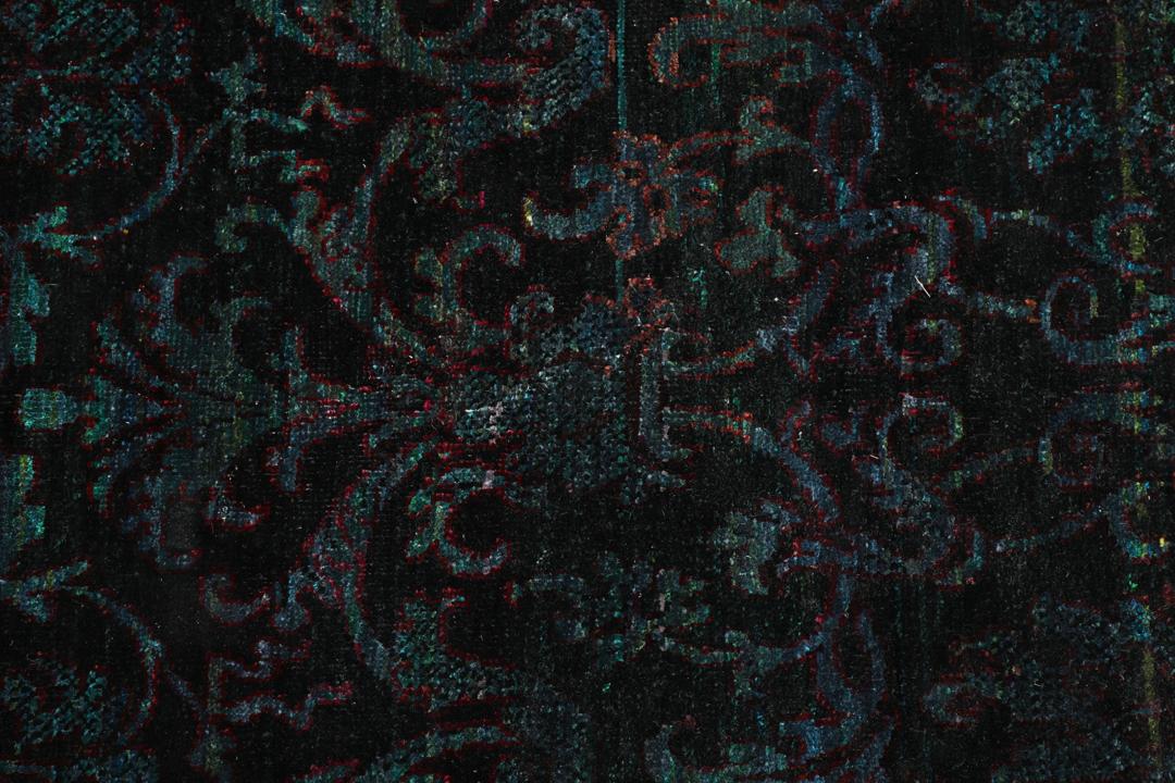 Hand-knotted Indian silk rug with a dark, intricate damask pattern