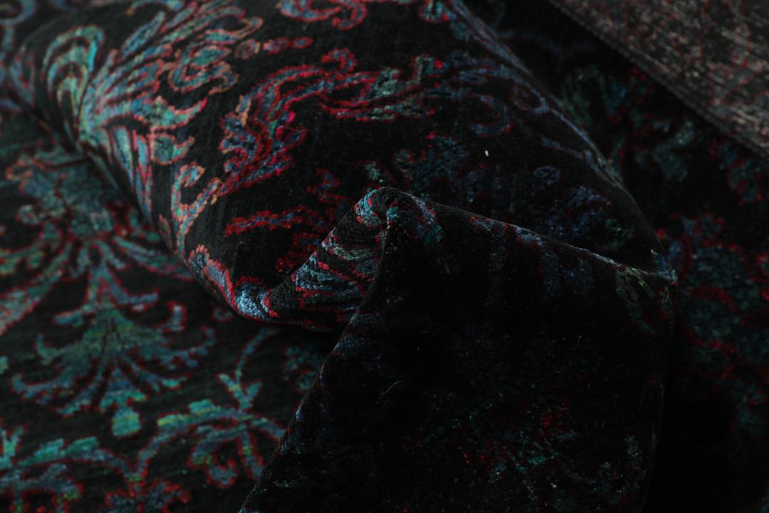 Hand-knotted Indian silk rug with a dark, intricate damask pattern