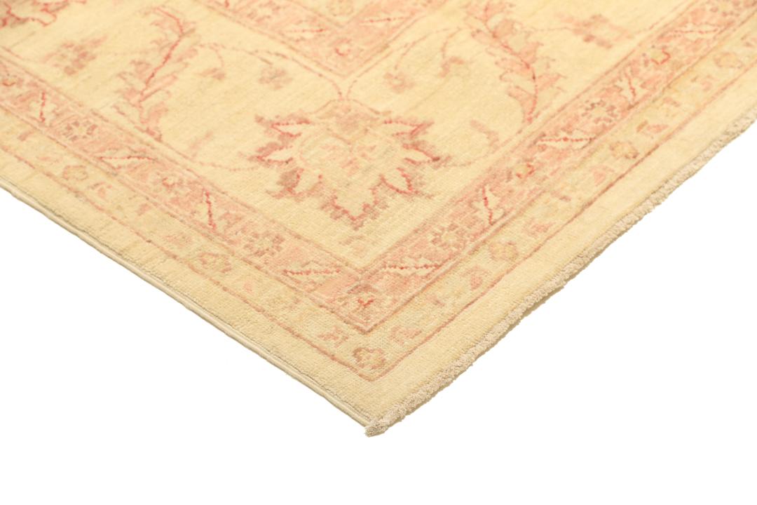 Hand-knotted Ziegler Fine runner with floral patterns in beige and red from Pakistan