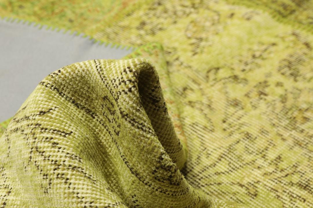 Een uniek patchworkkleed uit Turkije in tinten lichtgroen