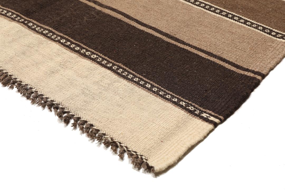 Håndvævet stribet tæppe fra Mellemøsten i brune og beige nuancer