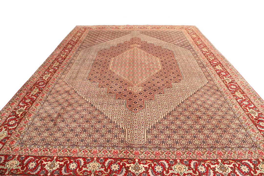 Handgeknoopt Senneh vloerkleed in rood en beige