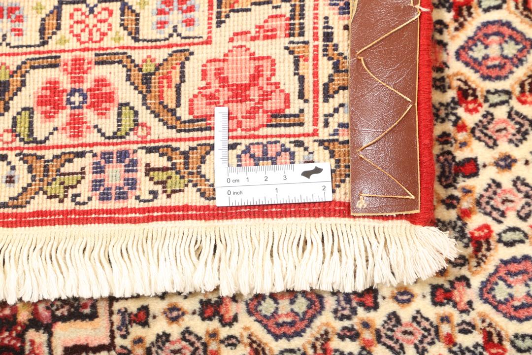 Handgeknoopt Senneh vloerkleed in rood en beige