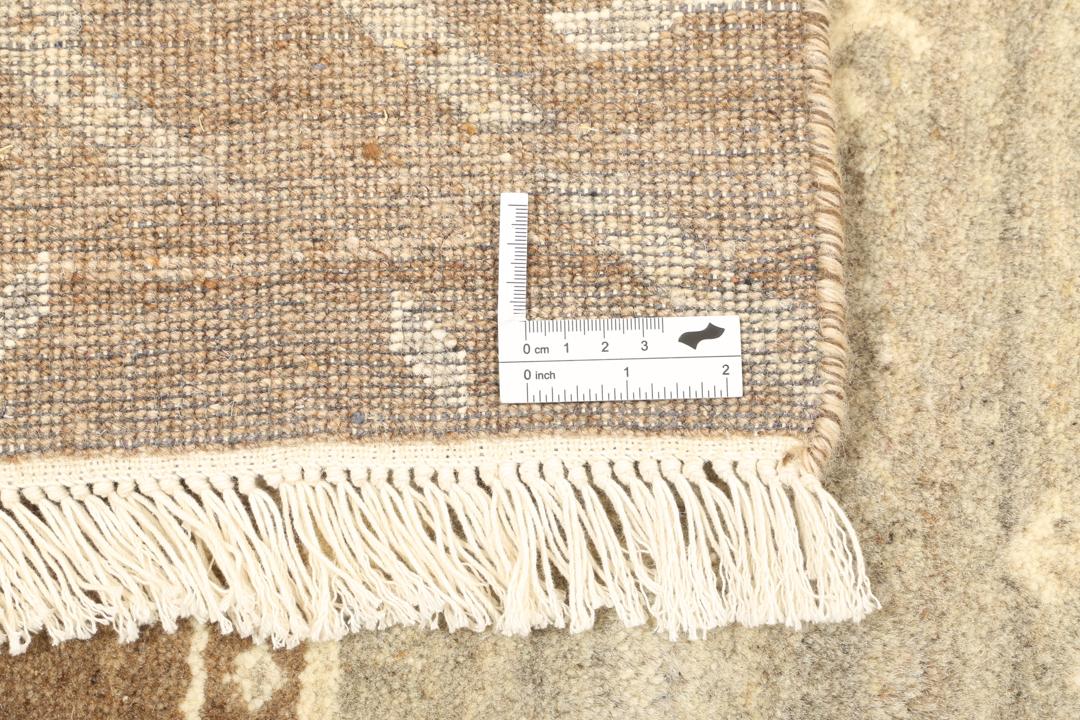 Håndknyttet indisk patchwork-tæppe i brune og beige nuancer