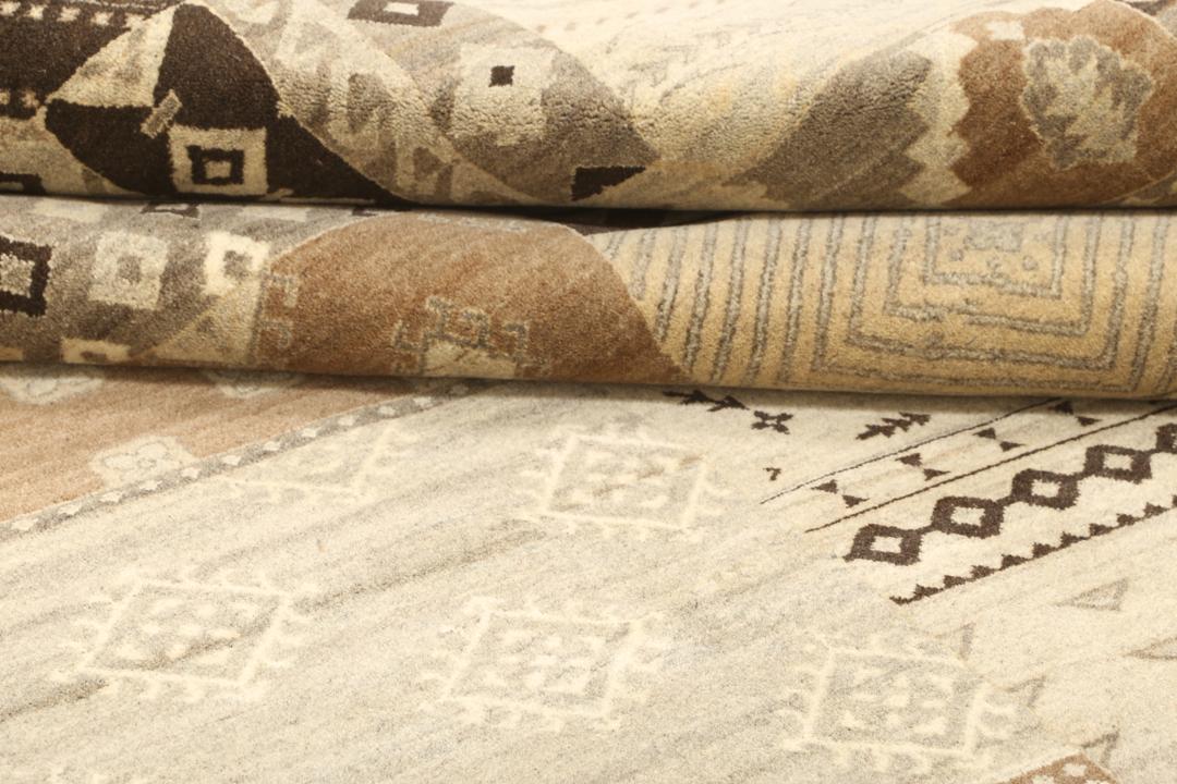 Modern patchwork rug with brown and beige geometric patterns from India