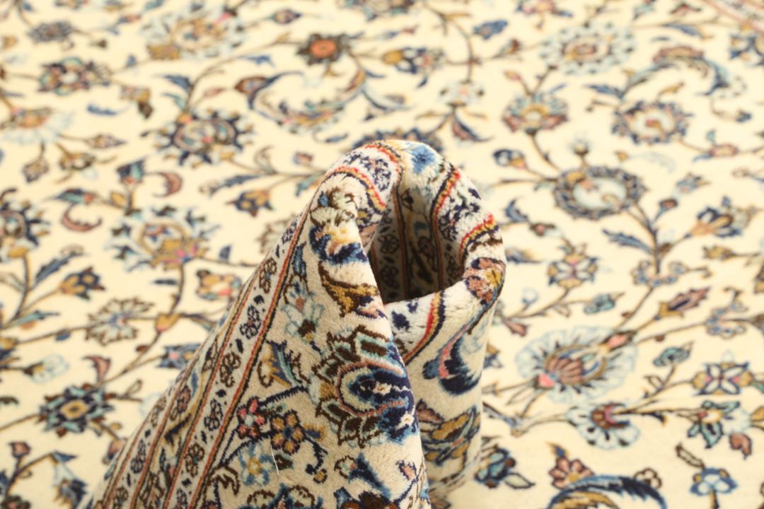 Hand-knotted Keshan rug from the Middle East in beige with floral patterns