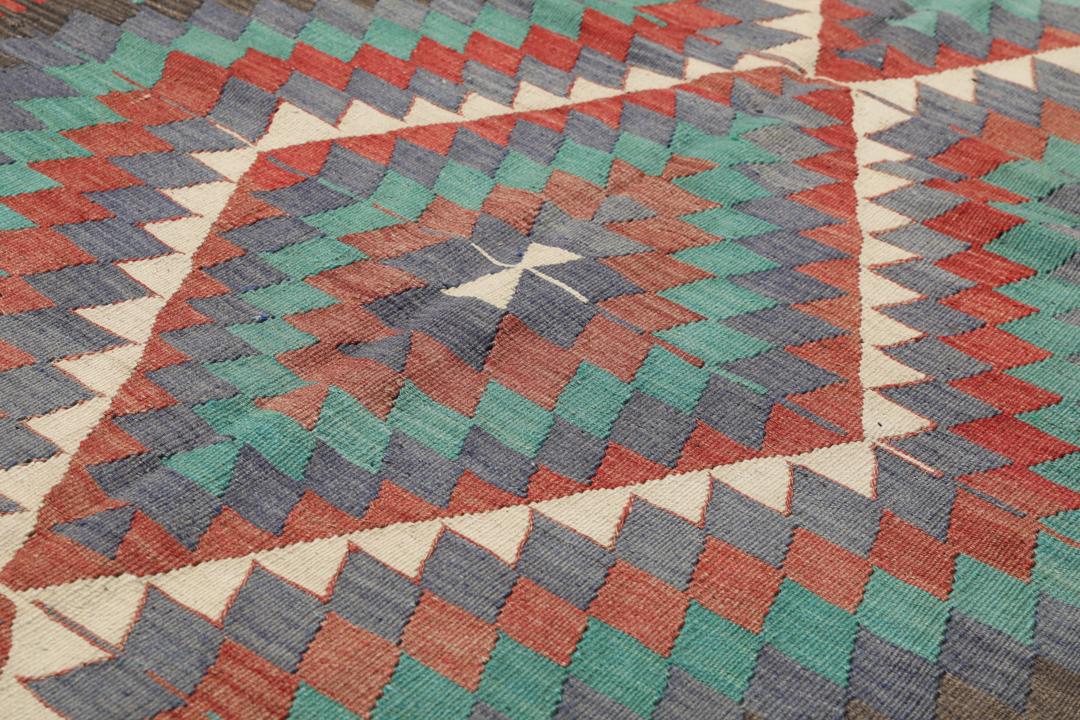 Tapis turc vintage avec motifs géométriques en losange multicolores