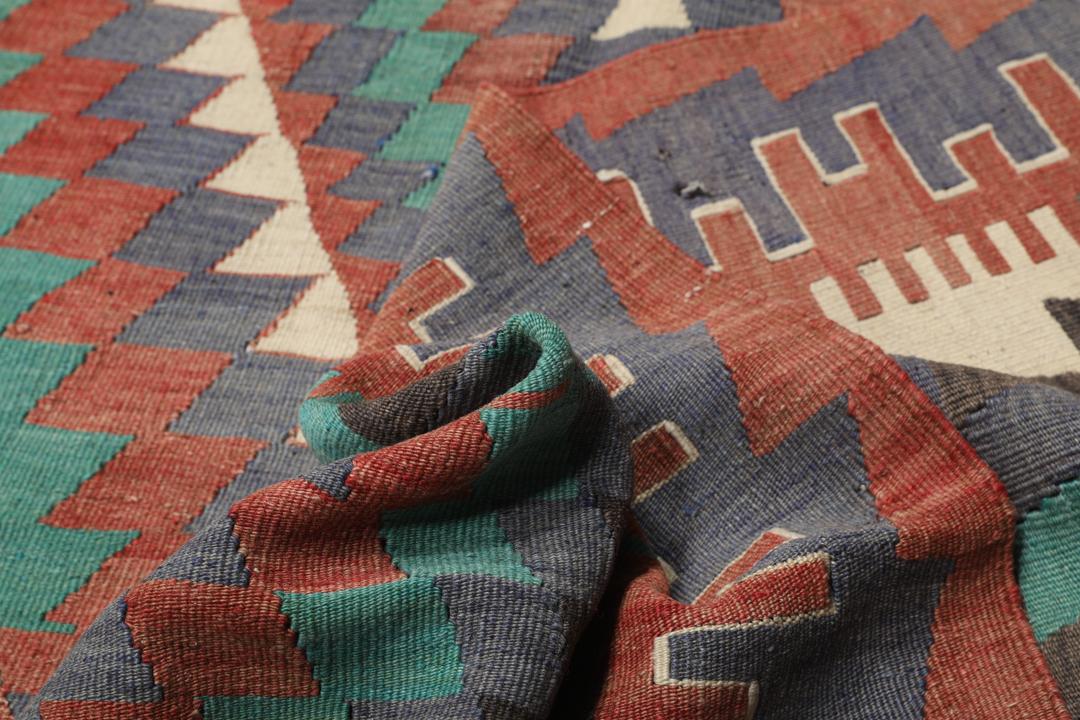 Tapis turc vintage avec motifs géométriques en losange multicolores