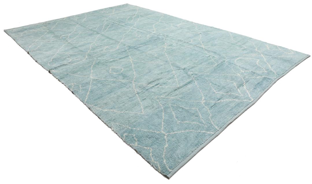 Tapis d'inspiration berbère noué main venant de Turquie dans une couleur bleu clair sereine
