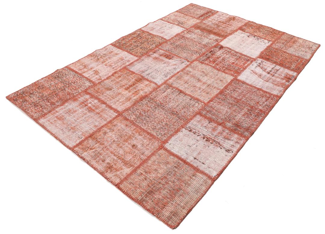Handgeknoopt Turks patchwork tapijt in warme rode tinten