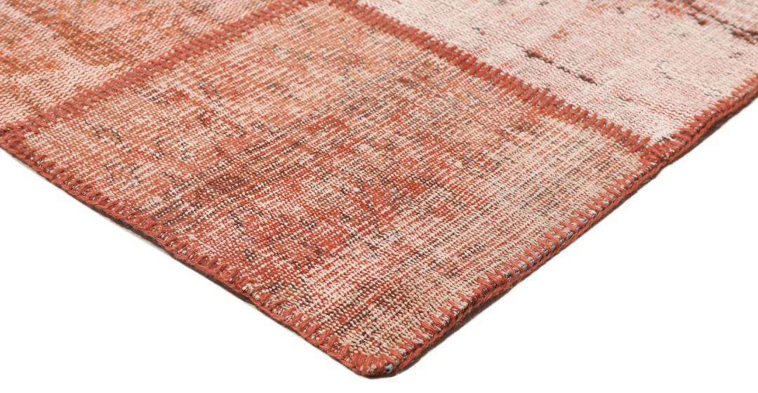 Handgeknoopt Turks patchwork tapijt in warme rode tinten
