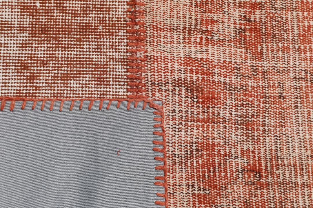 Handgefertigter türkischer Patchwork-Teppich in Rot und Erdtönen