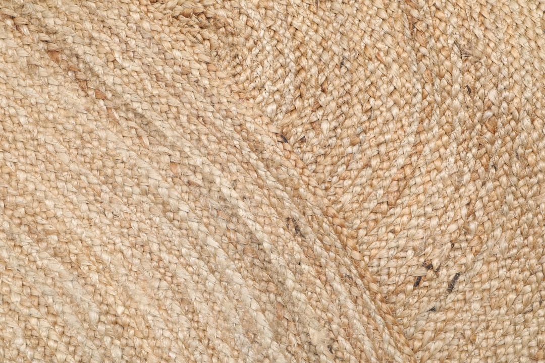 Rundt beige jutetæppe
