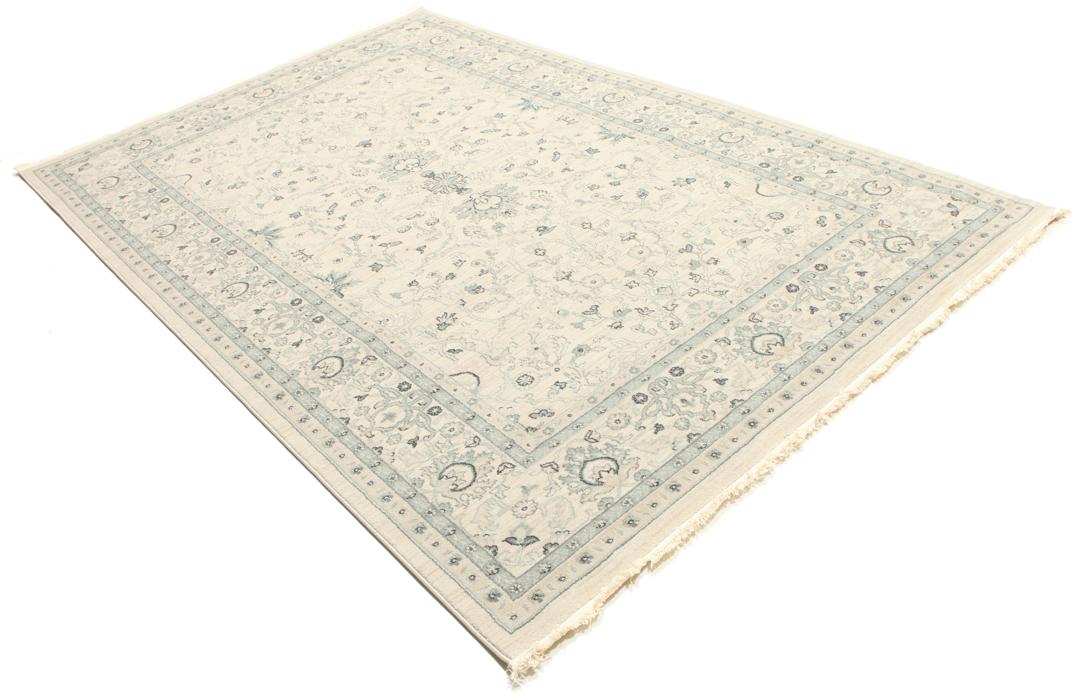 beige en groen tapijt met franjes