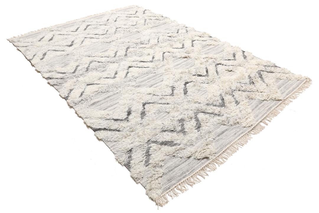Handgemaakt grijs wollen vloerkleed met een geometrisch patroon