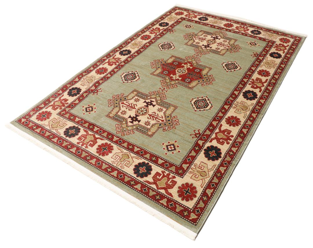 Lichtgroen en crèmekleurig beige vloerkleed met geometrisch patroon
