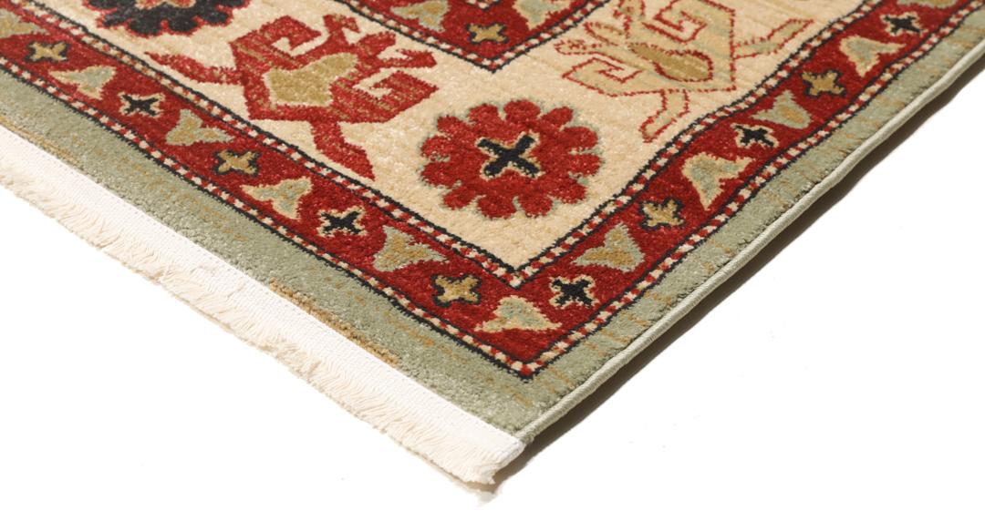 Lichtgroen en crèmekleurig beige vloerkleed met geometrisch patroon