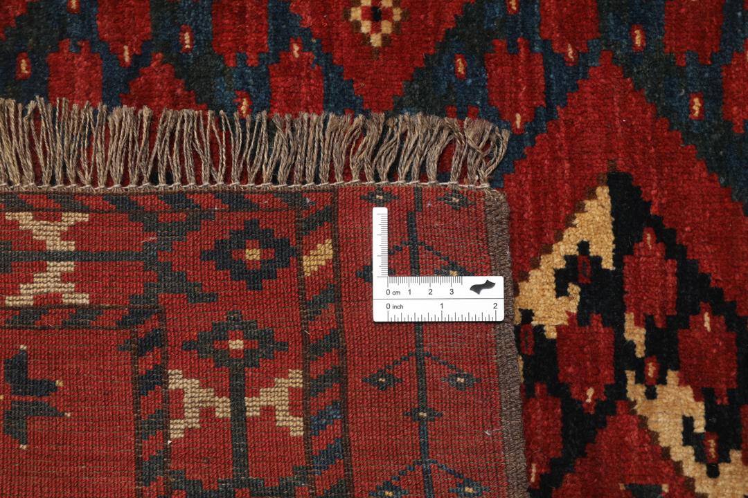 Håndknyttet afghansk Khal Mohammadi-tæppe i dyb rød med geometriske mønstre