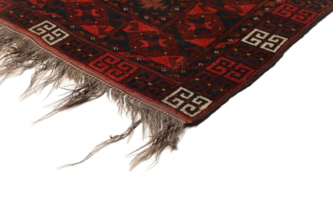 Tapis Afghan Khal Mohammadi noué à la main avec un motif géométrique rouge foncé et noir